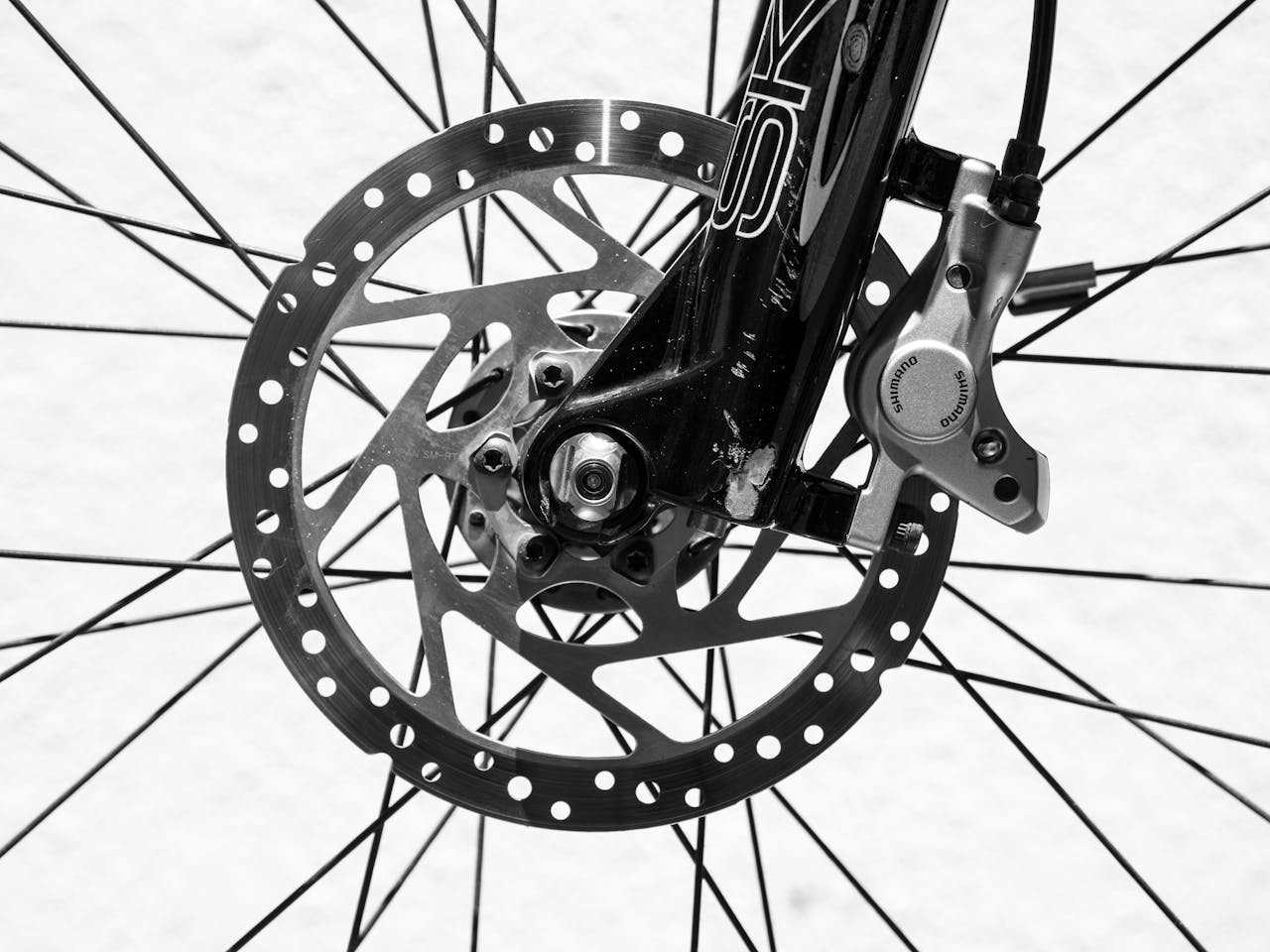 Black And White Photo Of Bicycle Spokes